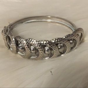 Silver tone hinged bracelet​